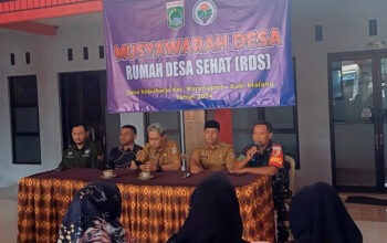 Sambutan Babinsa Kepuharjo dalam acara pembentukan Rumah Desa Sehat.